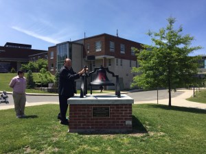 Assistant Principal Mike Scarpitto Ringing the Spirit Bell Before the Graduation Ceremony